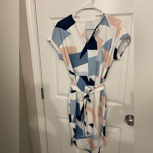 Ladies size Medium dress with tie.